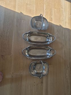 Set of four silver Serving dishes
