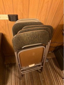 Six Cushioned Folding Chairs