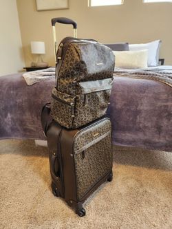 Calvin Klein carry on luggage and backpack set