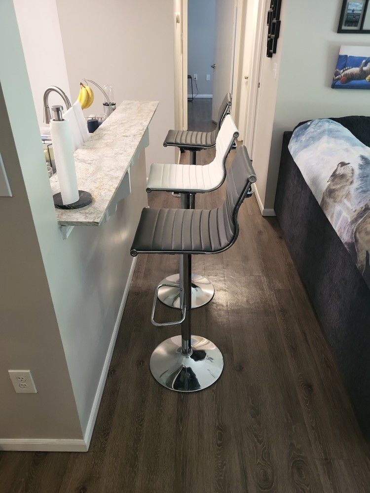 $300 Adjustable Bar Stools