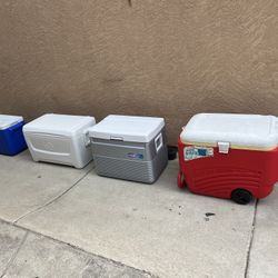 4 coolers asking $35 each /and small blue one $20 thanks 