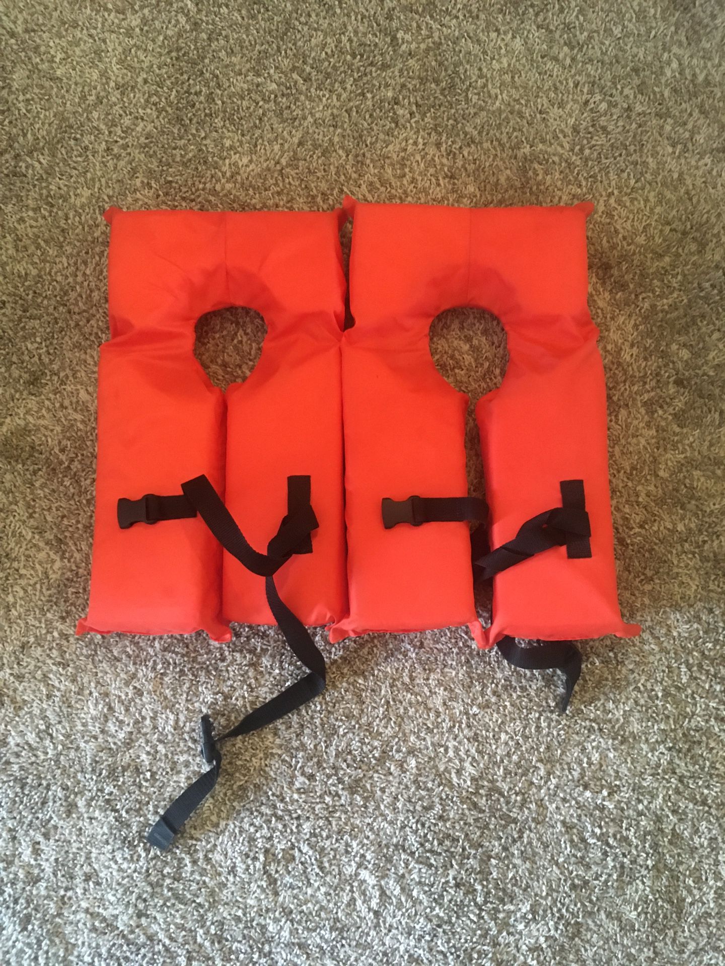 Two children’s life vests