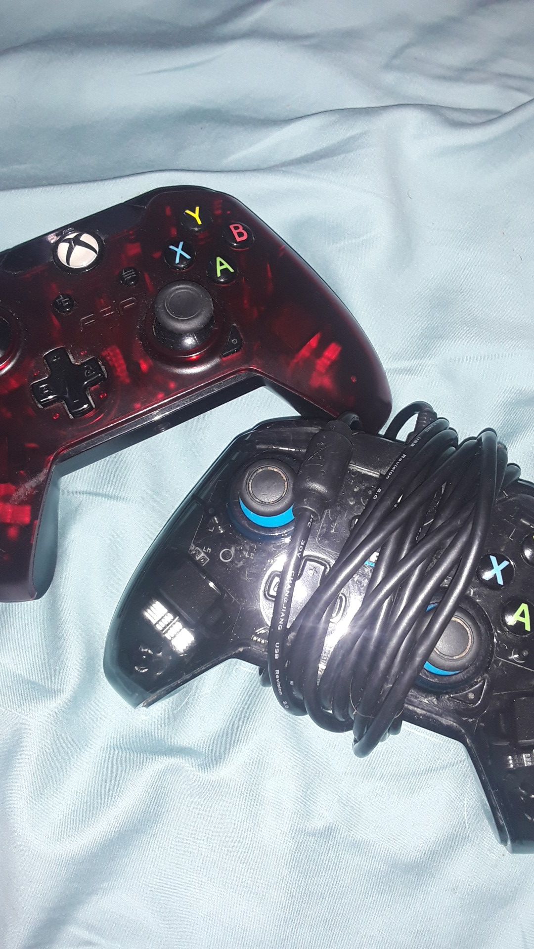 two wired xbox One controllers (work with 360, Xbox One, and PC) for