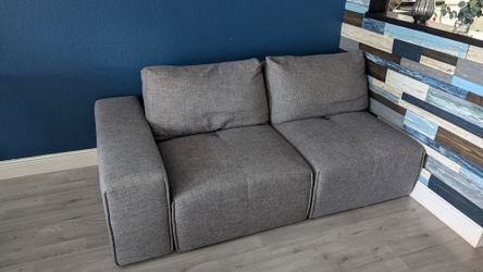 Sectional sofa with two potions