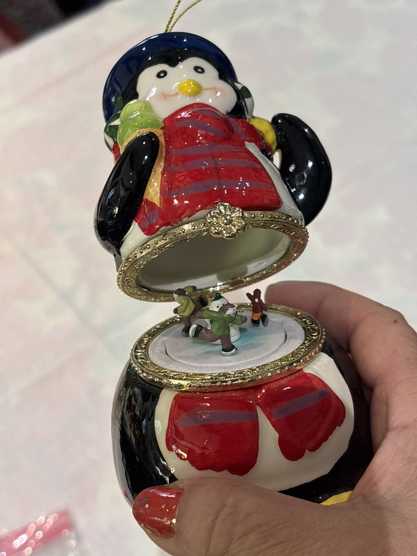 Christmas penguin windup music “Joy to the World “ ornament or table decor open and figures turn