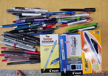 Most new in the box, some slightly used retractable and caps pens-blue, black, red.