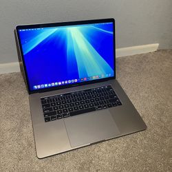 MacBook PRO 15 in’ i7 16GB,256gb SSD,100 🔋Health Adobe,final Cut, logic pro Ms office or best offe