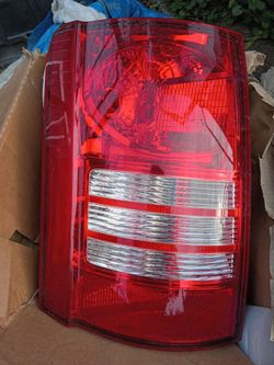 BrandNew Dodge caravan OEM taillight for driver side ONLY $25