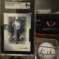 Tiger Woods signed good ball, and 2001 UD Rookie card SGC Graded 9