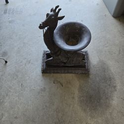 Giraffe statue birdbath.