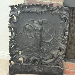 19th c. Antique Cast Iron Fire back showing angel holding shield and medallion of George Washington 