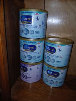 Enfamil Blue and Purple Cans