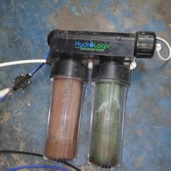 Two reverse osmosis water  filtration units.