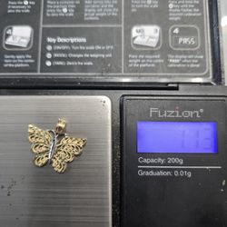 10kt GOLD BUTTERFLY PENDANT 