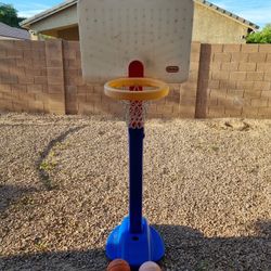 Kids basketball hoop with two Nike balls