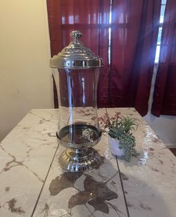 Nice Beverage Despencer With Flower Pot And Flower 