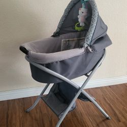 Like New Portable Bassinet And Stand ( Price Firm!)