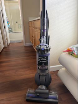 Dyson Upright Vacuum Cleaner, Ball Animal 2, Iron/Purple The wand does not work anymore and when it sits up it makes a noise but still vacuums I recen