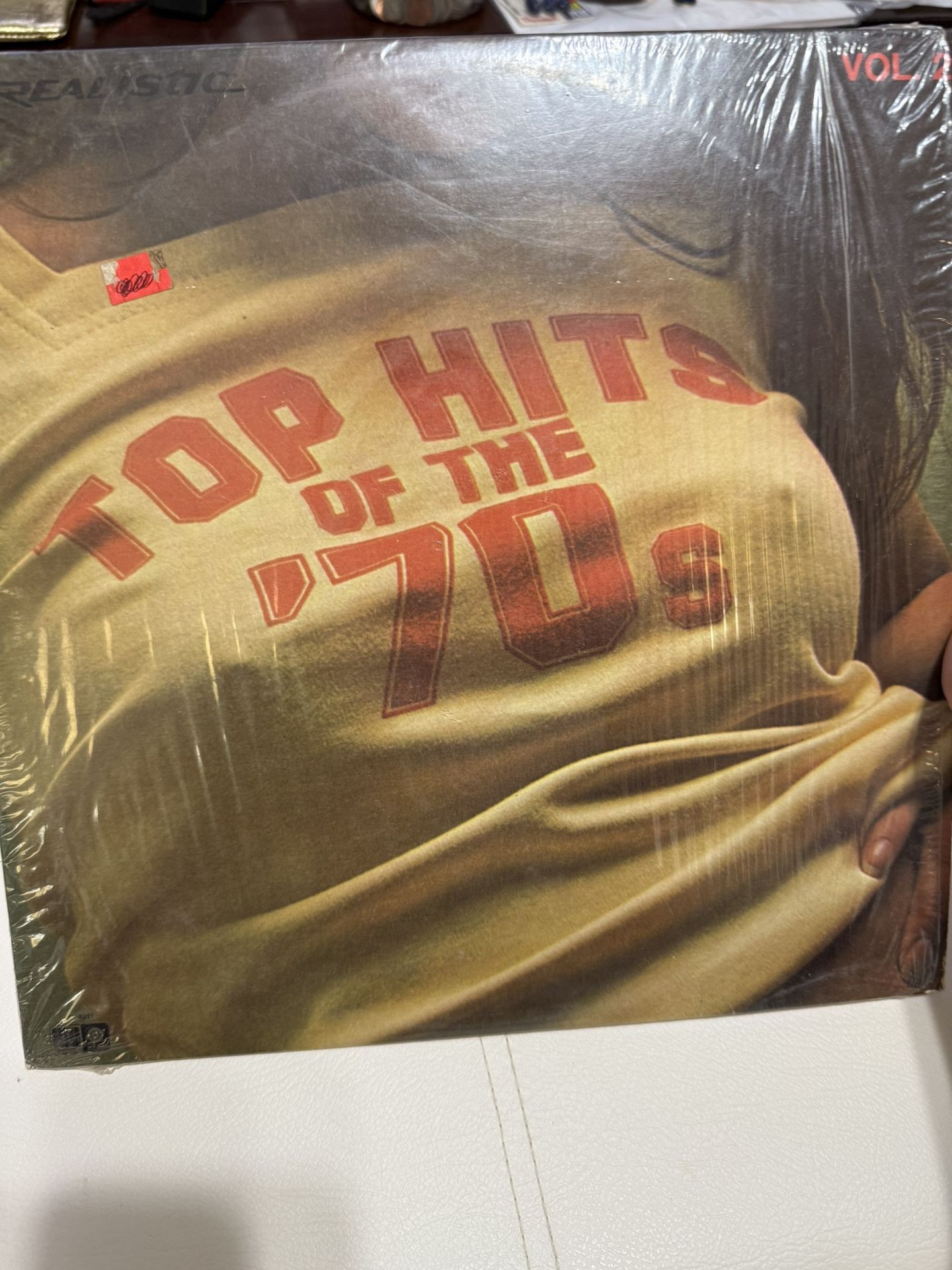Top Hits of the 70s, Vol. 2.This appears to be a compilation album featuring popular songs from the 1970’s