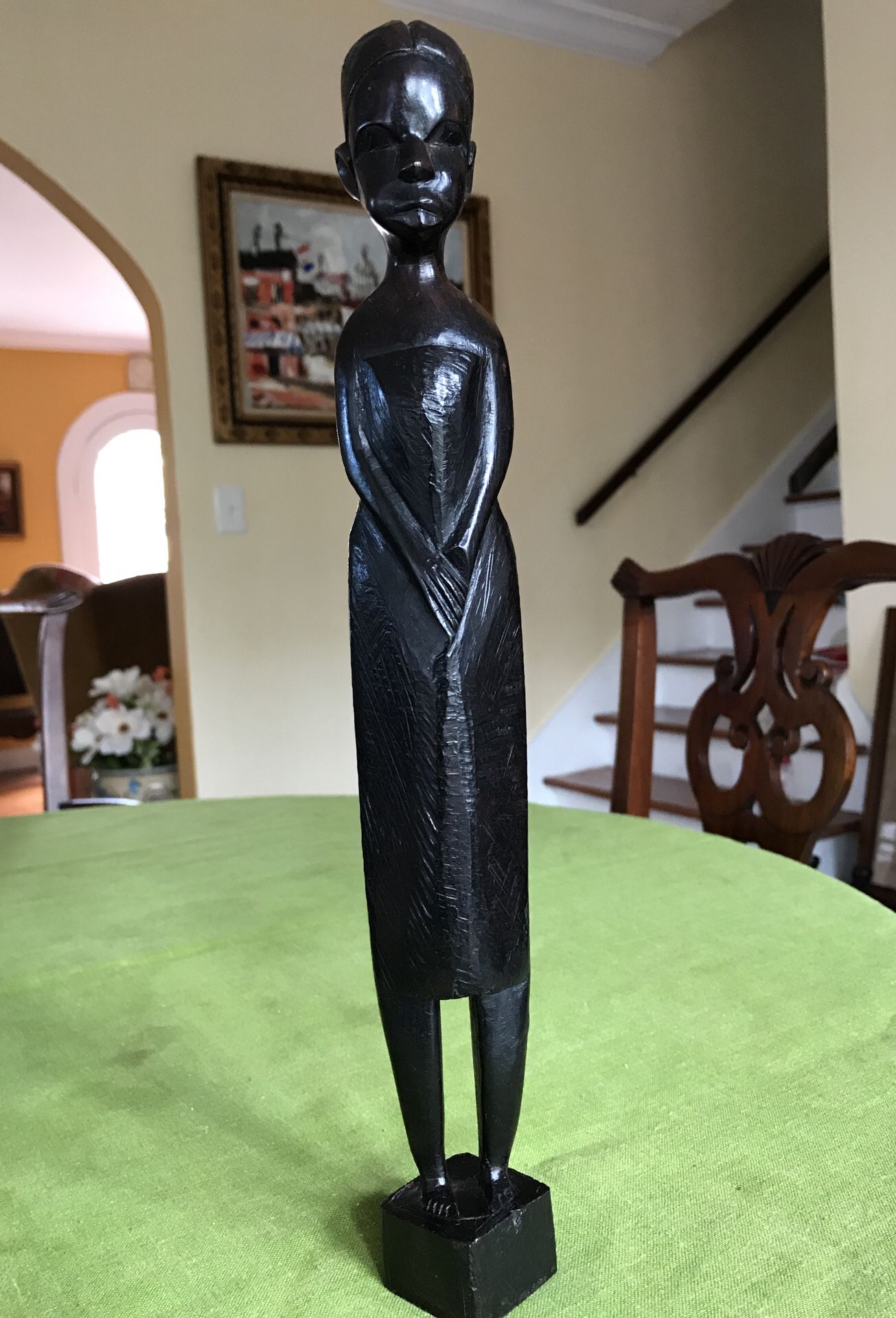 African carved wood woman statue standing 14 inches tall with a dark finish