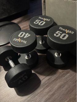 Urethane dumbbell weights ( 2x40 lb $80 )  ( 2x50 lb $100 ) FIRM ON PRICES