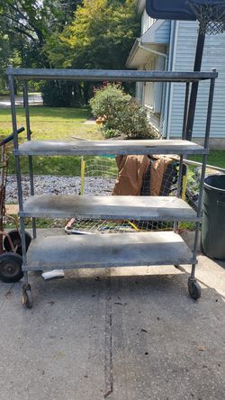 Rolling shelving unit