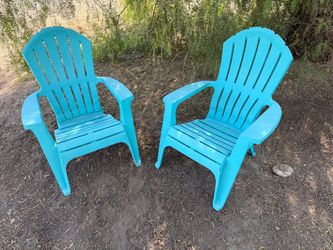 Pair of Adirondack chairs with lots of life left and minimal time spent in the sun