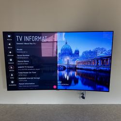 4k OLED LG 55” Curved TV + 4k Fire Stick + Wall Mount