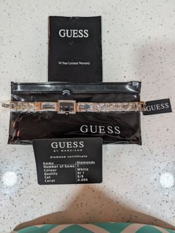 Women's New guess watch with genuine 0.005 diamond