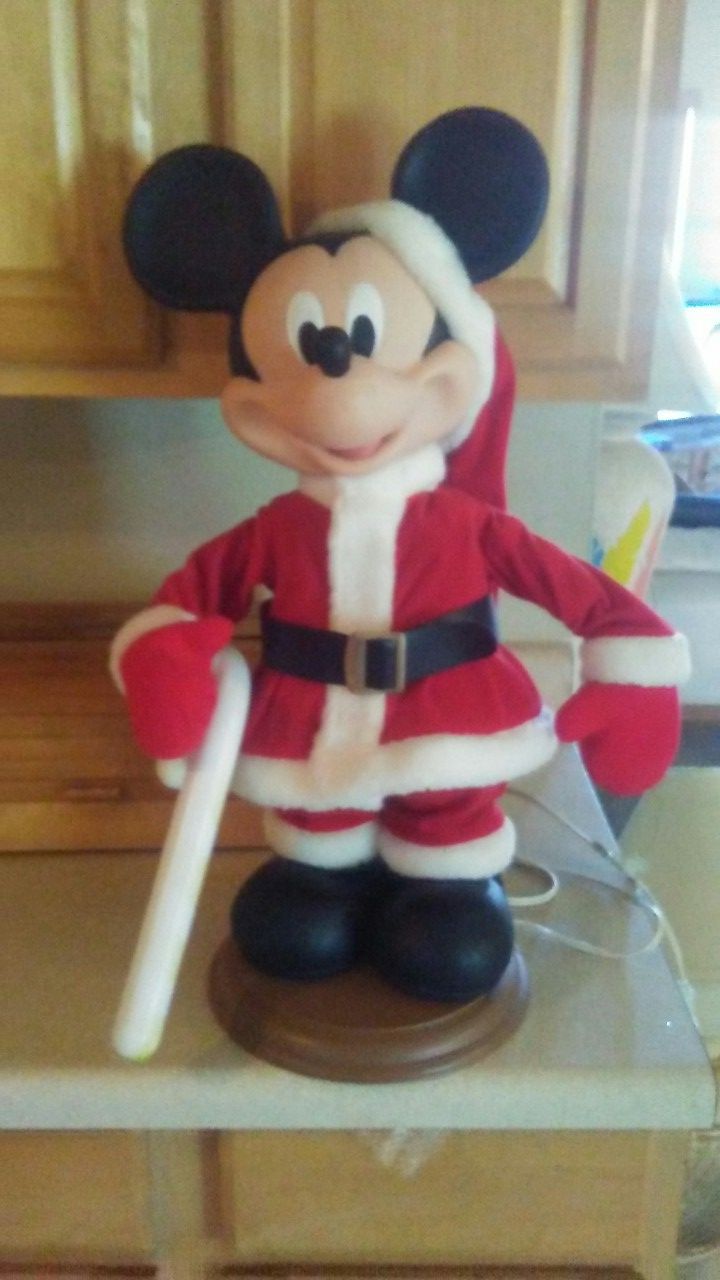 Mickey mouse electric movement toy is collectible iron working good condition cheap price