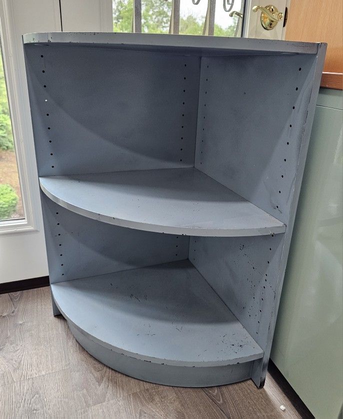 Real wood blue gray corner shelf.