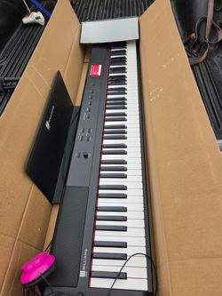 Piano keyboard with stand