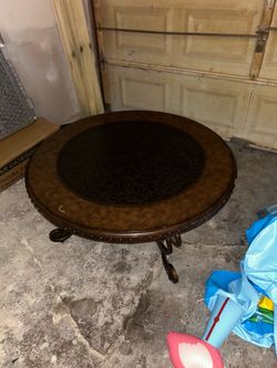 Signature Design by Ashley Rafferty round coffee table