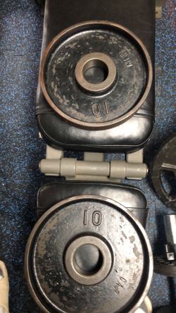 Pair of 10lb Olympic CAP plates $2 a lb
