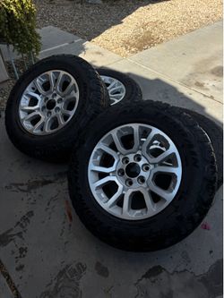 Chevy Silverado/Tahoe OEM Silver Stock Wheels 18”