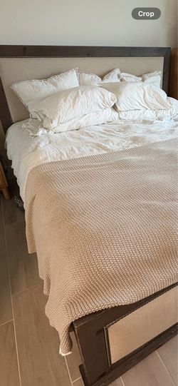Bed headboard and baseboard.