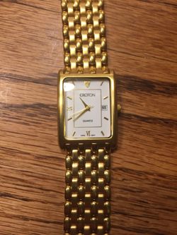 Croton gold tone watch