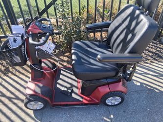 I have a almost new pride Electronic Wheelchair with Charger and Ramp for sale.. $2,000 or best offer..  Only been used around house..