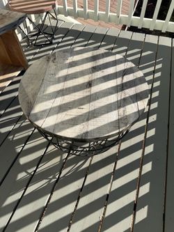 Rustic Round Coffee Table with Metal Basket Base