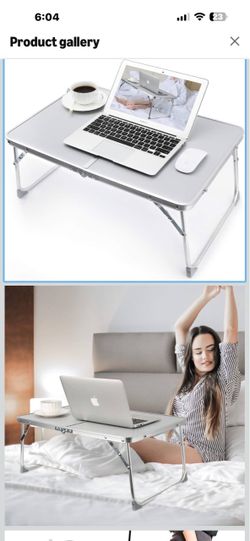 Lap top table for easy to store folds in half new got a different one Easy to use and good has handle