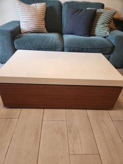 White Lacquer and Walnut Swivel Storage Coffee Table.