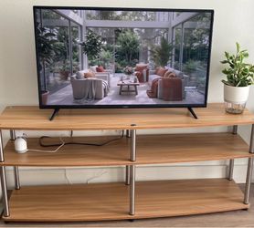 TV and TV stand (available on or after 24th June)