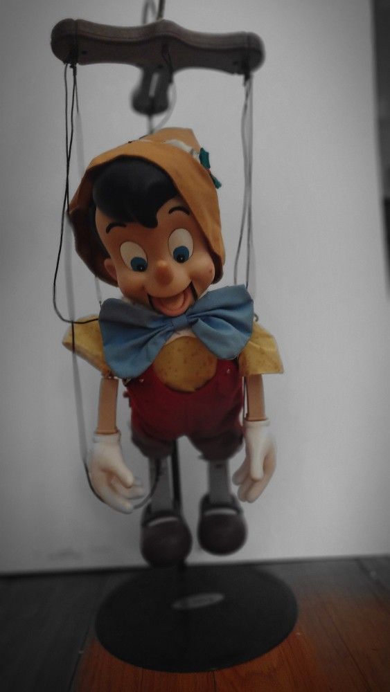 VINTAGE MUSICAL PINOCCHIO DOLL