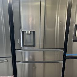 LG FOUR DOOR STAINLESS STEEL REFRIGERATOR 