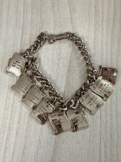 Pulsera stainless dijes medallas