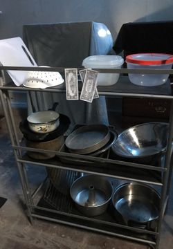 38" inches high by 28" wide folding three shelves stand