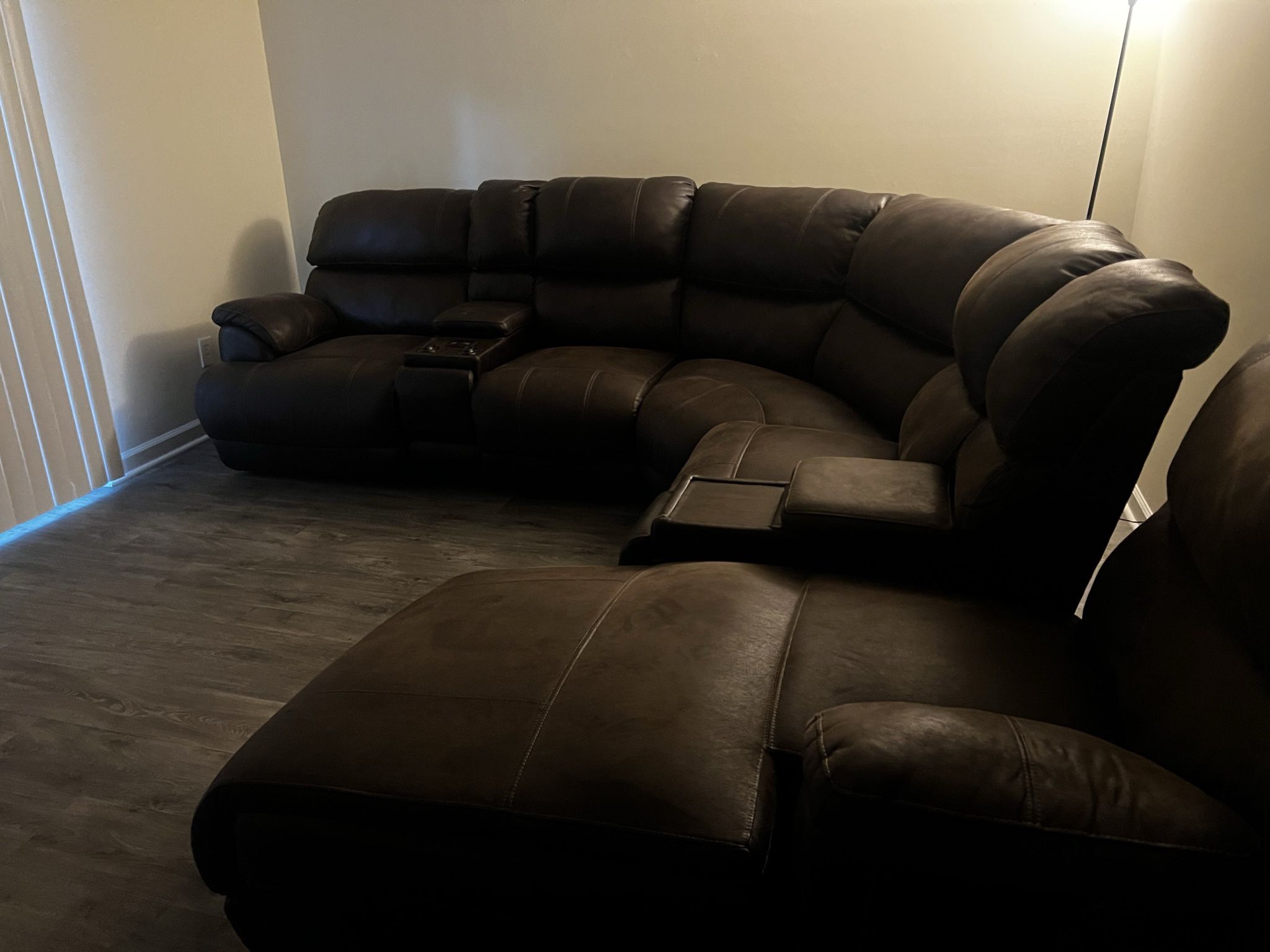 Brown Four piece Sectional With Massager, Recliner, Lights, Cupholders And Compartments