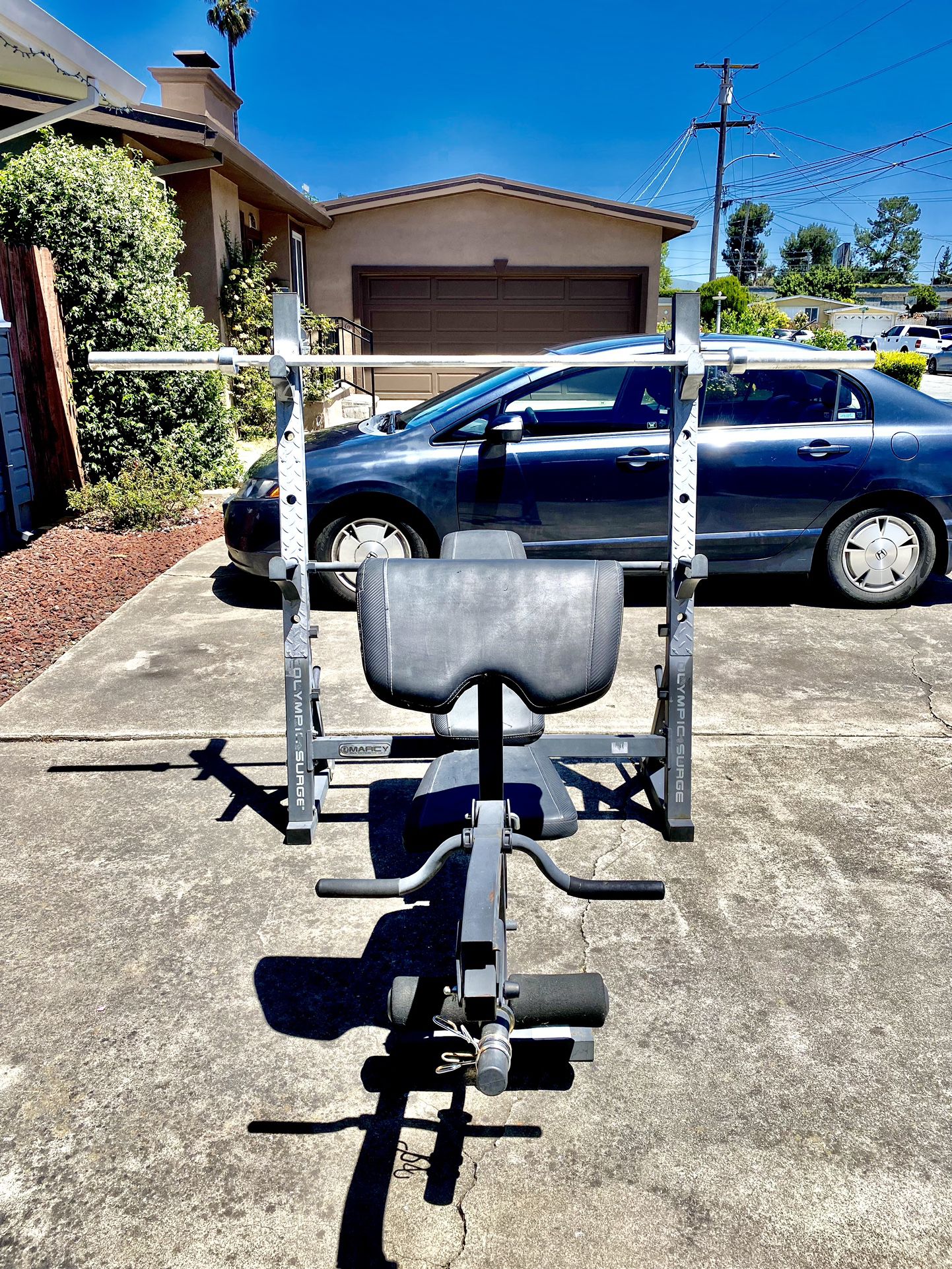 Rack barbell and bench (Barbell sold)