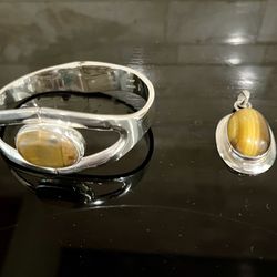 Sterling Silver Hinged Bracelet And Large Oval Pendant With Genuine Tigers Eye Gem