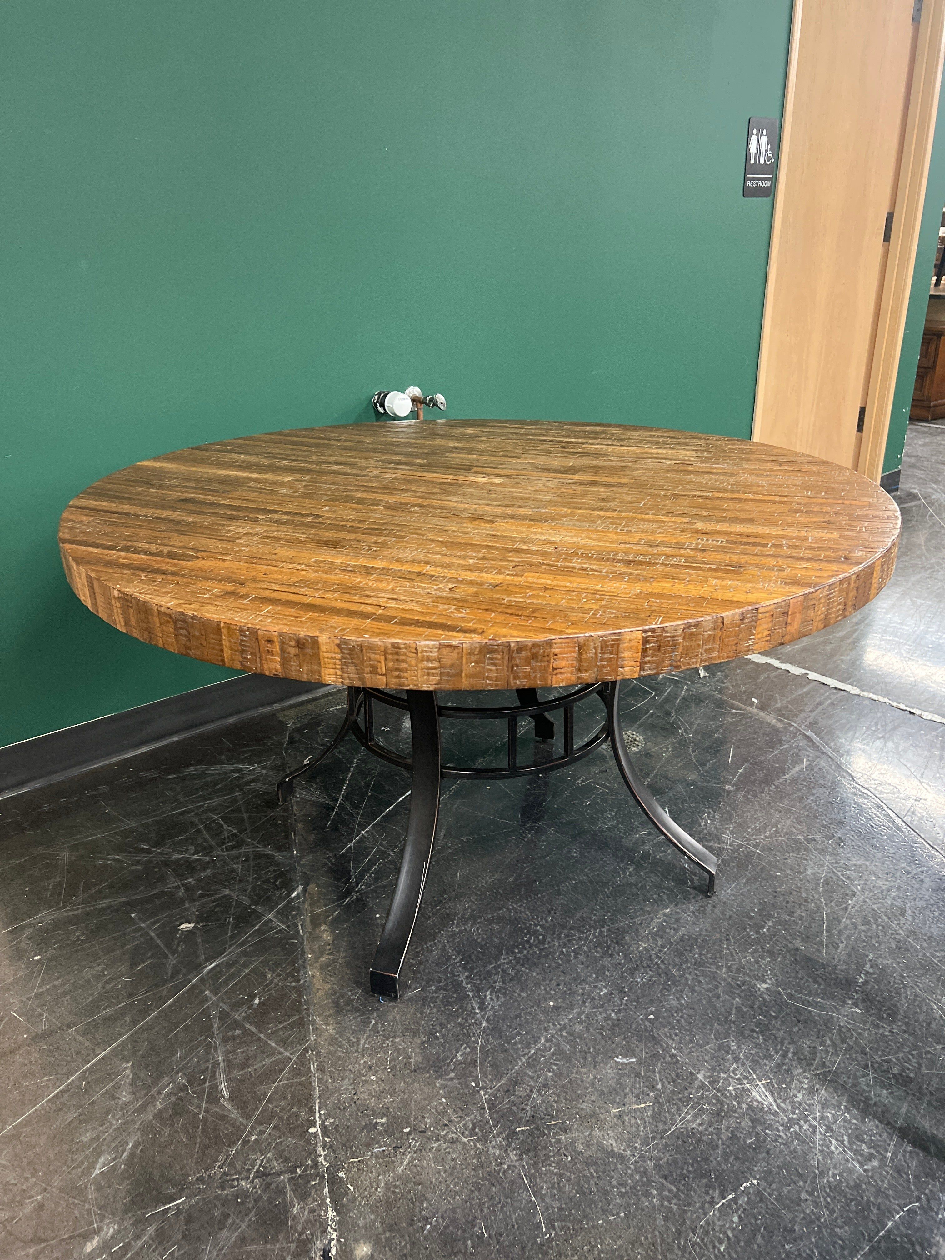 Rustic Round Wood Plank Dining Table with Industrial Metal Base